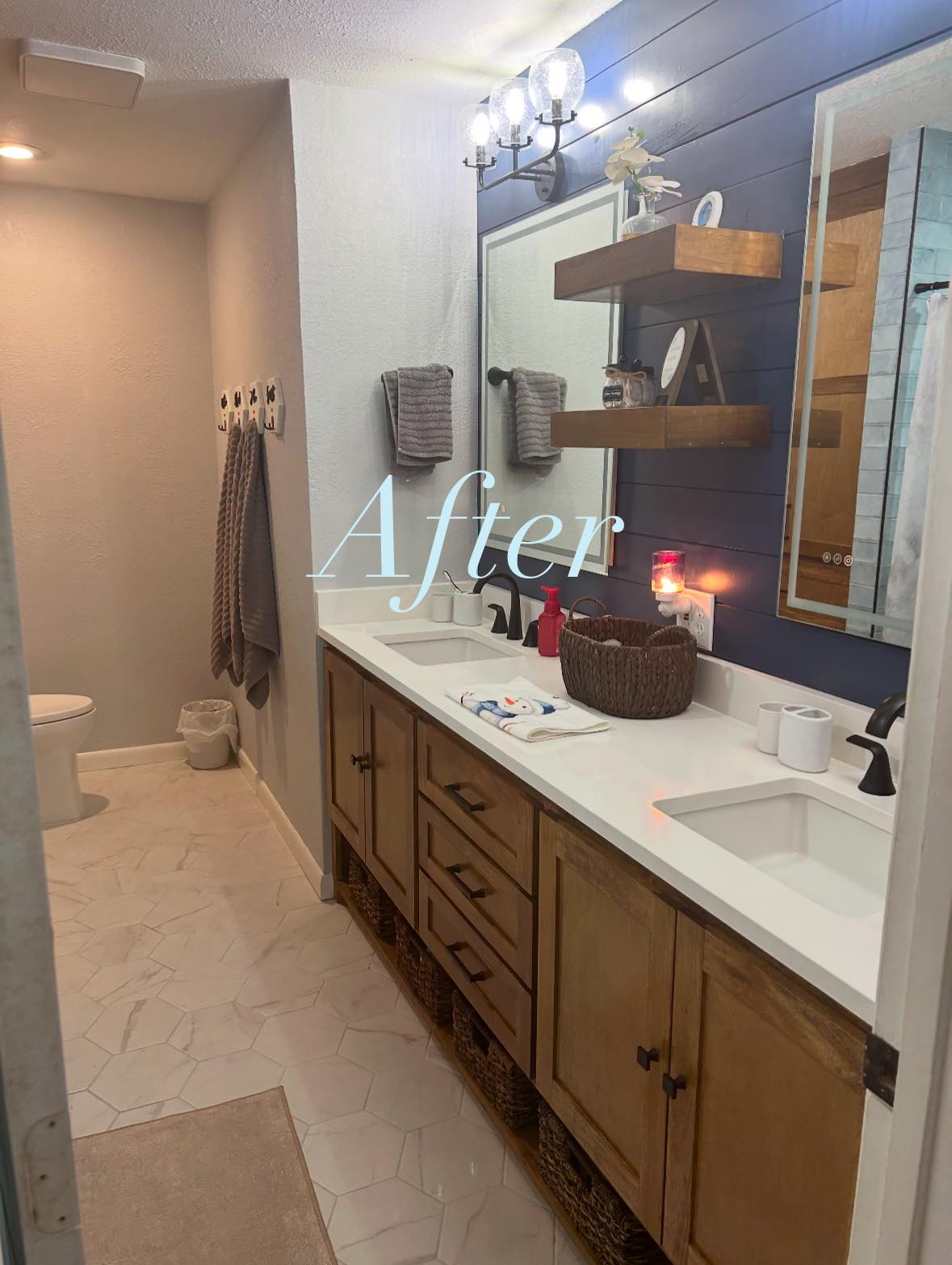 Bathroom remodel with double vanity and tile floor